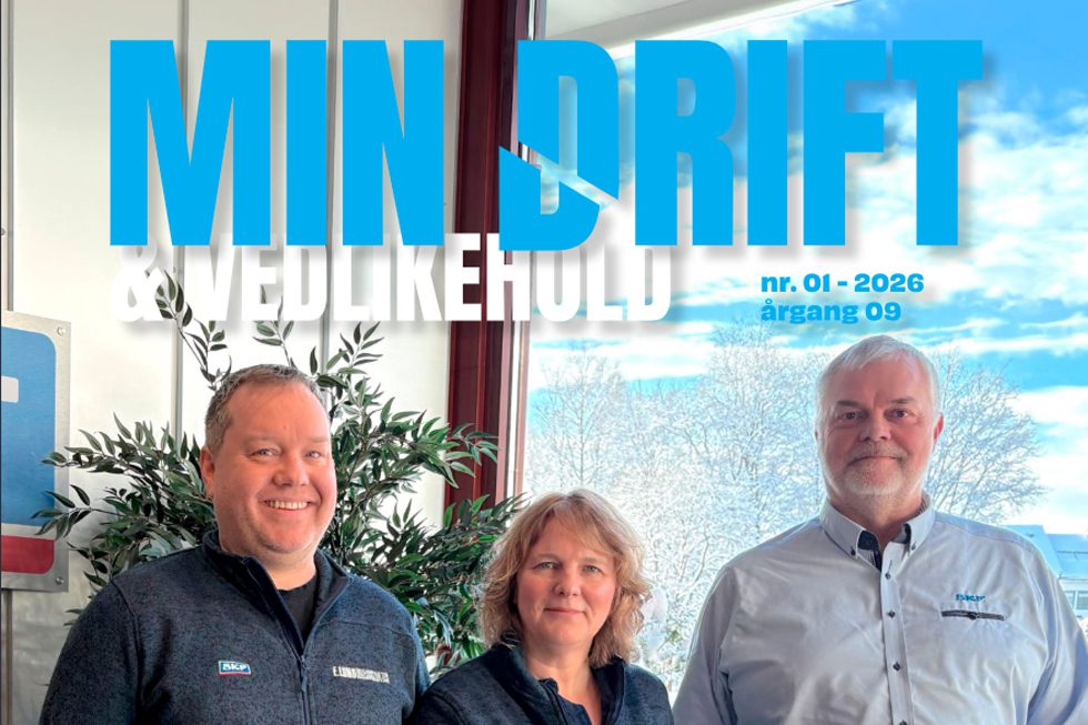 Three adults pose for a photo on a magazine cover titled 'MIN DRIFT & VEDLIKEHOLD'; blue headline text dominates the top, with a snowy window scene in the background and people wearing company apparel inside.